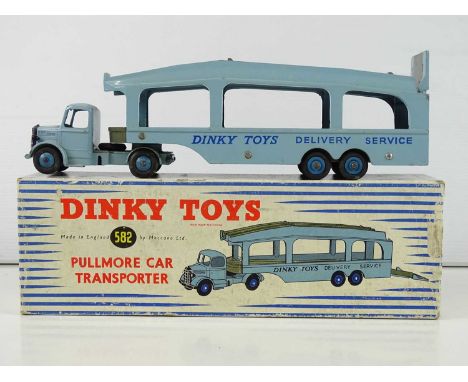 A DINKY Toys 582 Pullmore Car Transporter in light blue with fawn decks, early six rivet version - G in F/G box