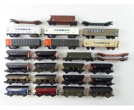 A group of OO Gauge rolling stock, mainly hopper wagons, by HORNBY, LIMA, etc. in various liveries, some couplings missing - 