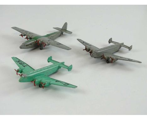 A group of three unboxed DINKY aircraft  comprising a 62p Whitworth airliner 'Explorer' in grey/green liveries and 2 x 62y Gi