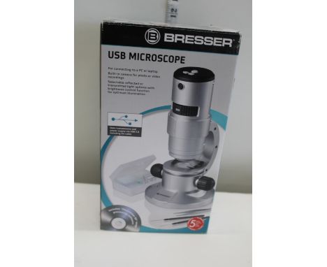 A boxed Bresser USB microscope 