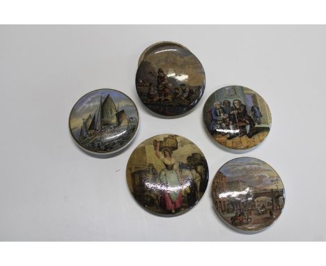 A selection of assorted ceramic pot lids 