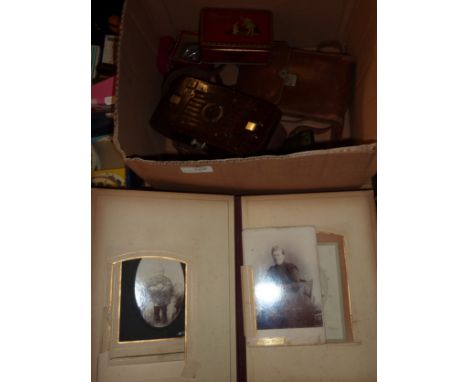Victorian photo album with black and white photos, wooden counters, early 20th C brown bakelite vest pocket camera, small pai