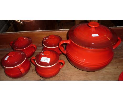 Set of four ceramic Le Creuset soup bowls and lid and a ceramic Le Creuset lidded soup tureen