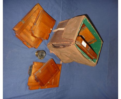 Selection of vintage photographic items including folding plate camera, plates, canvas case etc