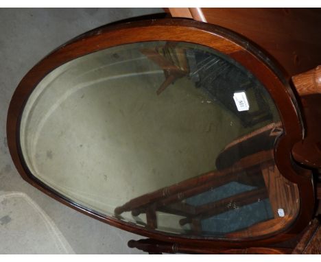 Mahogany framed shield shaped mirror 