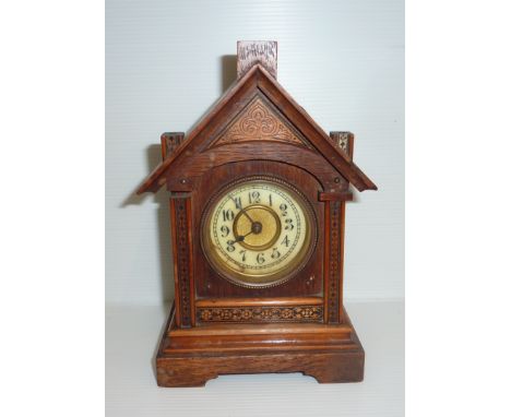 Small oak cased mantel clock 