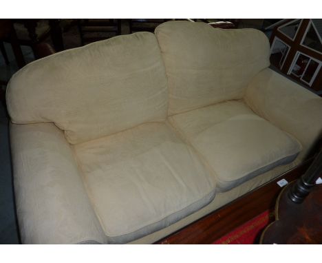 Large two seat sofa with loose covers