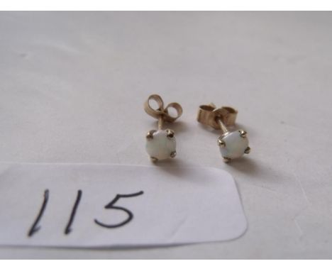 A small pair 9ct opal ear studs     