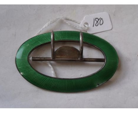 A large green enamel buckle 2.75" wide    