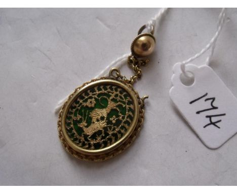 Antique high carat gold & green enamel pendant of a hunting scene       