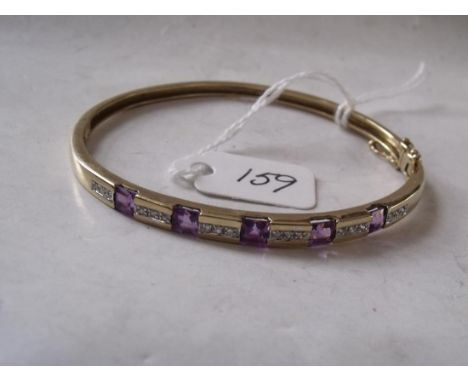 An amethyst and diamond 9ct bangle 9.7g    