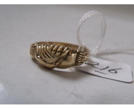 9ct ring in the form of a pair of clasped hands approx size 'Q'       