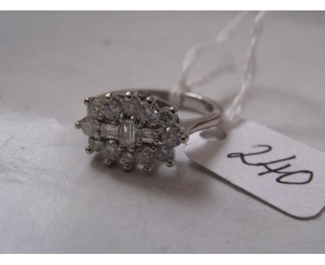 18CT WHITE GOLD FANCY DIAMOND CLUSTER ring set with baguette and round diamonds the  total weight 1 carat approx size 'M'    