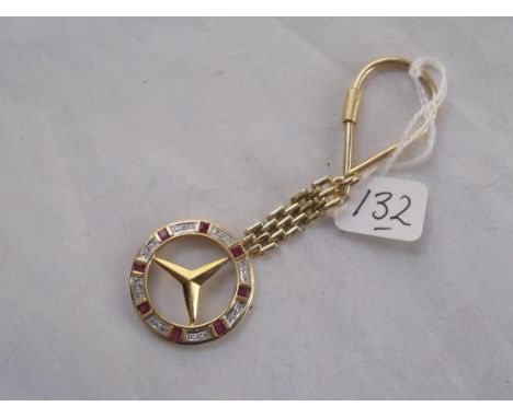 AN UNUSUAL 18CT GOLD MERCEDES KEY RING SET WITH RUBIES & DIAMONDS  15.9g   