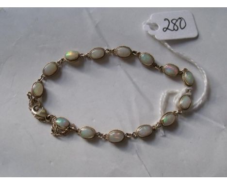 9ct mounted opal bracelet 7" long 5g inc    