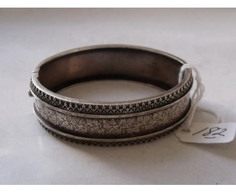 An embossed silver bangle 22g     