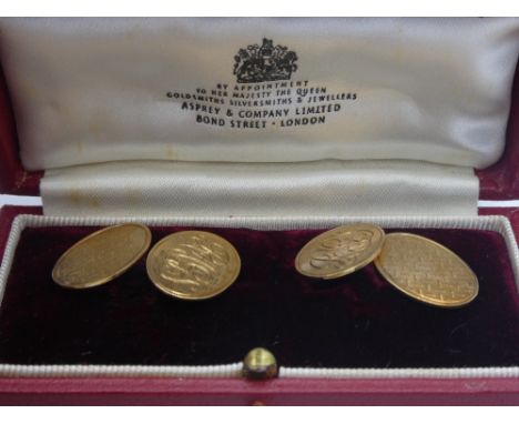 Pair of 9ct gold gentlemens cuff links, double sided oval, engine turned backs 8g 