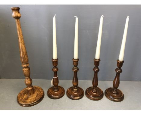 Set of 4 turned wooden candlesticks &amp; a tall turned wooden candlestick 