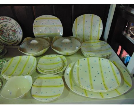A collection of Midwinter Modern Fashion Shape dinner wares with yellow, blue and black stripe and star design comprising a p