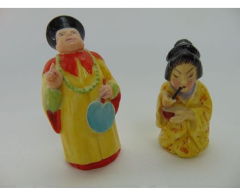 Two Royal Worcester candle snuffers in the form of a Mandarin in yellow and orange robes and a kneeling Geisha, also in yello