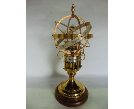 The Orrery Clock,an original collector's timepiece by The St James' House Company, principally in brass, raised on a pedestal