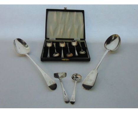 A Victorian silver Fiddle pattern basting spoon, Josiah Williams & Co., Exeter, 1867, with monogram, 149.8g; a George III sil