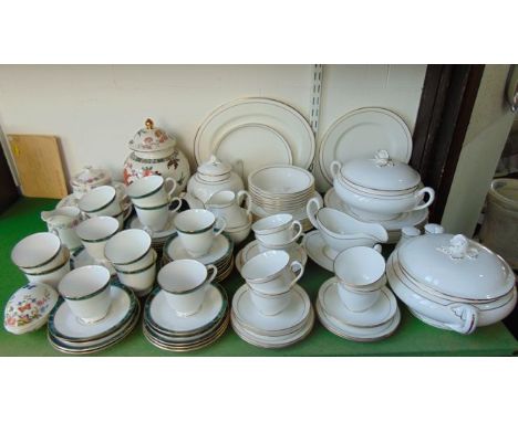 A quantity of Royal Worcester Contessa pattern dinner and tea wares with white glaze and gilt border decoration comprising a 