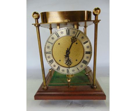 The Spheroid Weight Clock by Thwaites & Reed, Bowling Green Lane, London, England, principally in brass, raised on a squared 