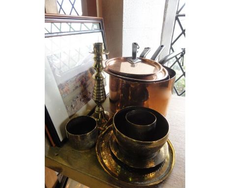 Two good quality graduated 19th century lined copper saucepans with heavy applied iron handles and matching lids, a single br