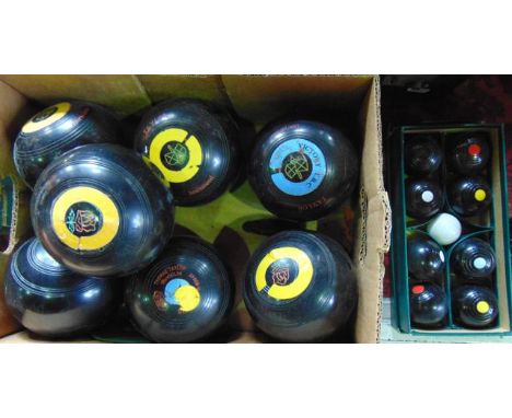 Seven vintage composition Thomas Taylor bowls together with a boxed set of miniature B & A carpet bowls