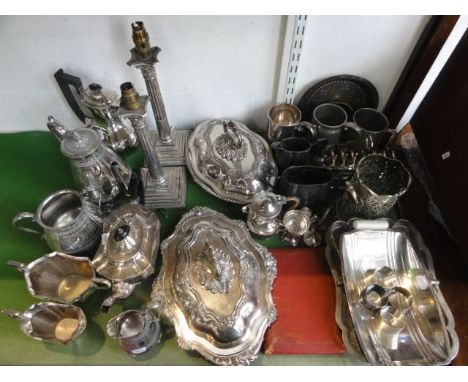 A quantity of 19th century and other silver plated wares including a matched pair of silver plated lamp bases in the form of 