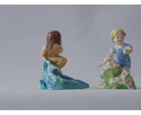 Two Royal Worcester figures, one modelled by F G Doughty and showing May represented by a little girl in blue dress picking w