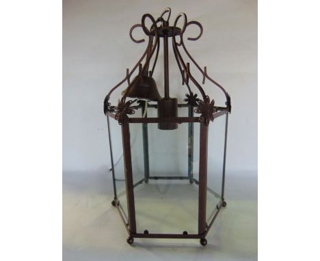 A single hexagonal ceiling lantern with clear glazed panelled sides