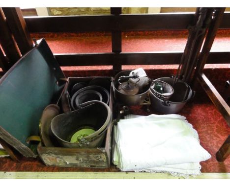 A miscellaneous collection to include a vintage stitched leather suitcase, a brass coal helmet, an eastern copper vessel with