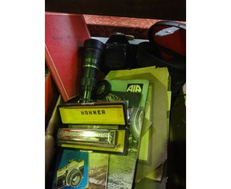 A boxed miscellaneous collection to include Pyrene fire extinguisher, a cased Praktica Super TL 3 camera with Pentacon lens, 