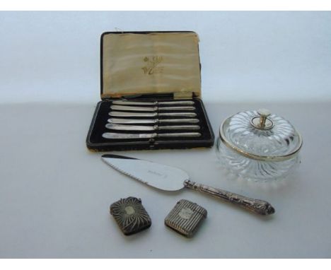 A late Victorian silver-mounted glass powder container, John Grinsell & Sons, Birmingham, 1899; a cased set of six silver han