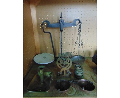 A 19th century set of beam scales with blackened ironwork frame raised on a twisted stem supporting a ceramic plate marked - 