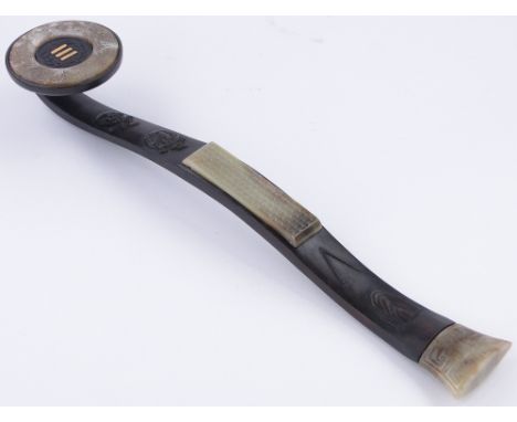 A Chinese carved wood rui sceptre with carved jade mounts,
length 17.25".