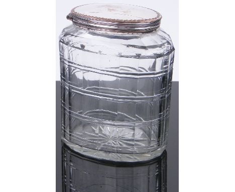 A Georgian facet-cut glass oval tea caddy,
circa 1800, with Sheffield plate top, height 12 cm.