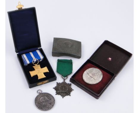 First World War German and other medals,
a buckle and a Second World War German wounded badge, (5).