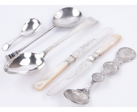 6 pieces of silver flatware,
including early Georgian bright-cut tablespoon, Dublin 1788, a seal end spoon 1903, a coin set s