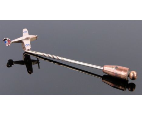 A 9ct gold and enamel stickpin in the form of a British Fighter plane,
wing span 20mm.