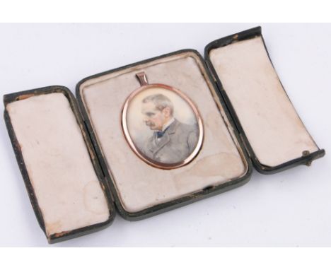 A Victorian miniature portrait of a gentleman,
in original leather case, height 3.75" overall.