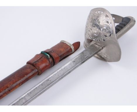 A George V Royal Engineer's sword and scabbard by Wilkinson's,
blade length 32", 38.5" overall.