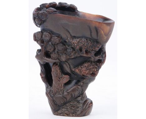 A Chinese 19th century buffalo horn libation cup,
with bird, figure and pine tree design and 4-character mark, height 4.4".
