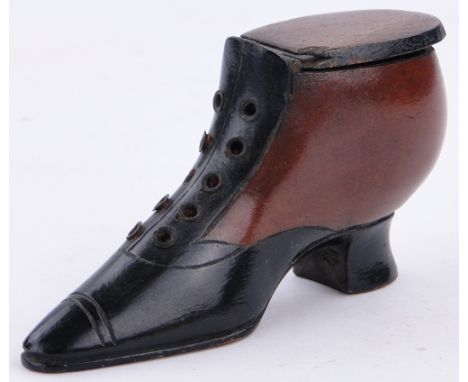 An Antique treen shoe design snuff box,
length 4.75".