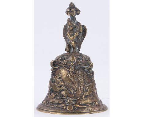 A cast bell with hunting scene,
height 4.8".