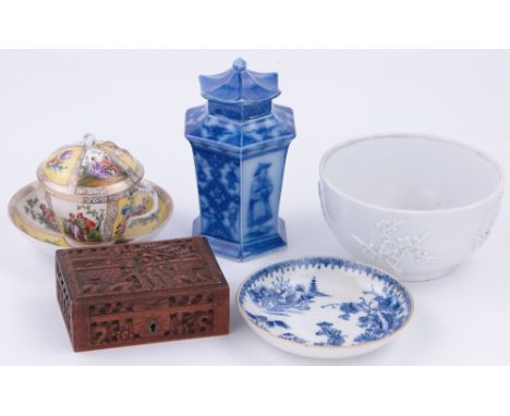 A Dresden chocolate cup and saucer,
an oriental porcelain bowl with prunus decoration, saucer, tea caddy and an Oriental carv