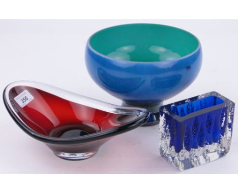 A Caithness blue glass bowl by Phil Chapman,
8" diameter, a red glass dish and a blue vase.