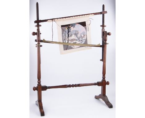 A Victorian mahogany tapestry maker's stand,
with turned supports, height 46.5".